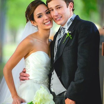 eva smiling with her groom