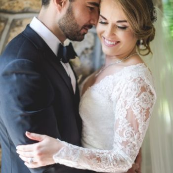 olga and her groom embracing at wedding