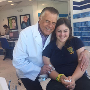Dr. Grussmark with female patient
