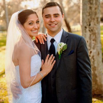 karina smiling with her groom