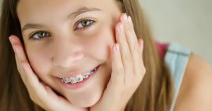 girl with braces smiling