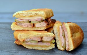 Cuban sandwich cut into three pieces