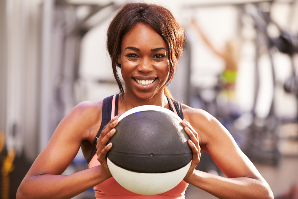 woman holding a basketball