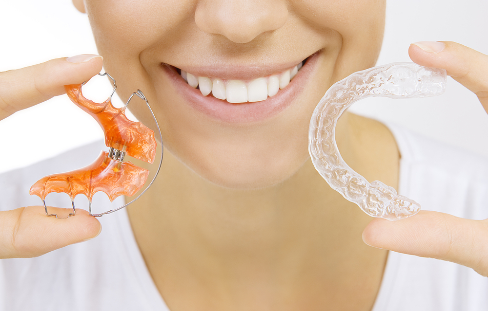 patient holding aligner and retainer